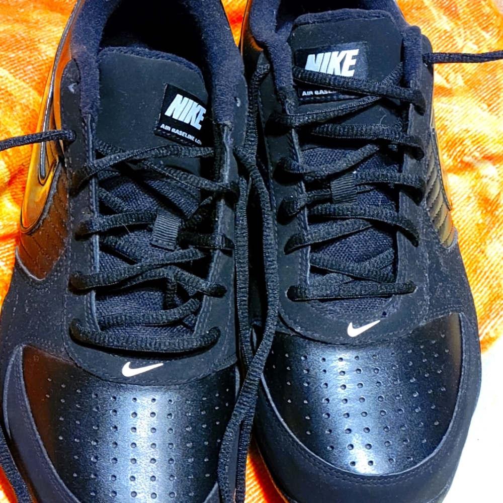 Nike Mens Sneakers.. Size 10. Leather..Black with white swoosh